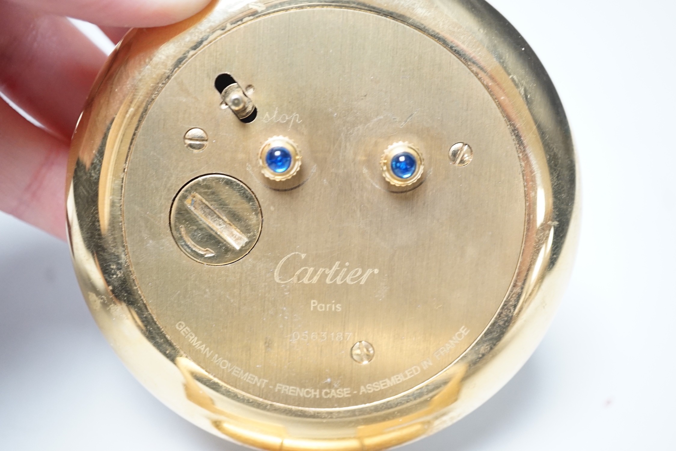 Cartier travelling alarm timepiece in case, serial number 0563187